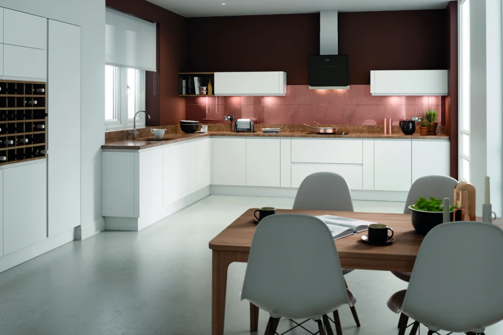 Modern kitchen with sleek shaker cabinets, glossy doors, and stylish handles, creating a beautifully functional space.